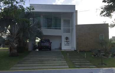 Imagem: A casa possui 3 Dormitórios, 4 Banheiros, 2 Vagas na garagem