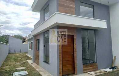 Imagem: A casa possui 3 Dormitórios, 2 Banheiros, 1 Vaga na garagem