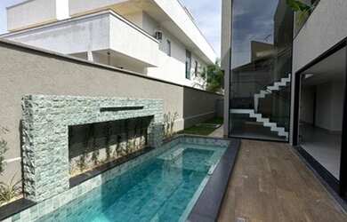 Imagem: A casa em condomínio possui 4 Dormitórios, 5 Banheiros, 2