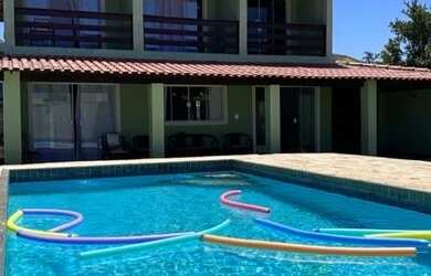 Imagem: A casa possui 4 Dormitórios, 4 Vagas na garagem e está localizado