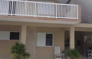 Imagem: A casa possui 3 Dormitórios, 3 Vagas na garagem e está localizado