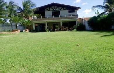 Imagem: A casa possui 5 Dormitórios e 5 Vagas na garagem e está localizado