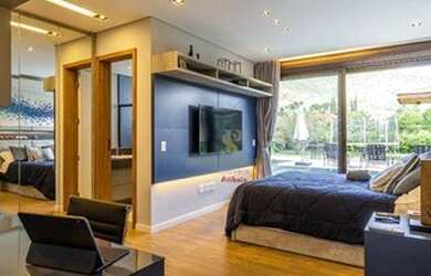 Imagem: A casa em condomínio possui 4 Dormitórios, 5 Banheiros, 5