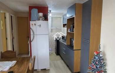 Imagem: O apartamento possui 2 Dormitórios, 1 Banheiro, 1 Vaga na garagem