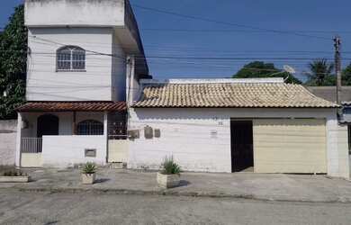 Imagem: A casa possui 2 Dormitórios e 1 Banheiro e está localizado