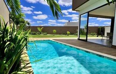 Imagem: A casa em condomínio possui 4 Dormitórios, 5 Banheiros, 4