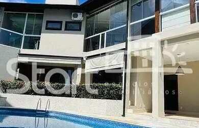 Imagem: A casa em condomínio possui 4 Dormitórios, 5 Banheiros, 4