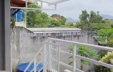 Imagem: A casa possui 4 Dormitórios e 3 Banheiros e está localizado