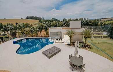 Imagem: A casa em condomínio possui 5 Dormitórios, 5 Banheiros, 5