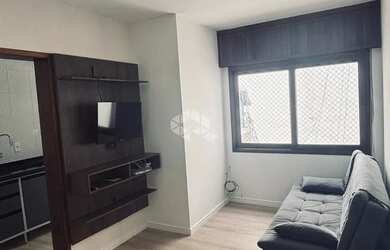 Imagem: O apartamento possui 2 Dormitórios, 1 Banheiro, 1 Vaga na garagem