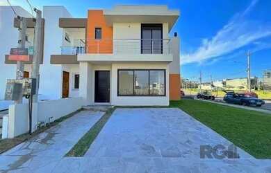 Imagem 5: Casa em Porto Alegre, no bairro Hípica, com 3 dormitório s , e 3 banheiros,...