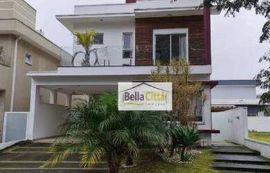 Imagem: A casa em condomínio possui 4 Dormitórios, 5 Banheiros, 4