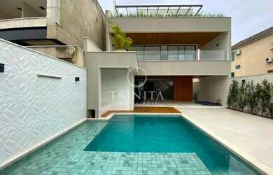 Imagem: A casa em condomínio possui 4 Dormitórios, 5 Banheiros, 2