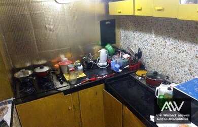 Imagem: A casa possui 2 Dormitórios, 1 Banheiro, 1 Vaga na garagem