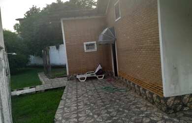 Imagem: A casa possui 2 Dormitórios, 1 Banheiro, 4 Vagas na garagem