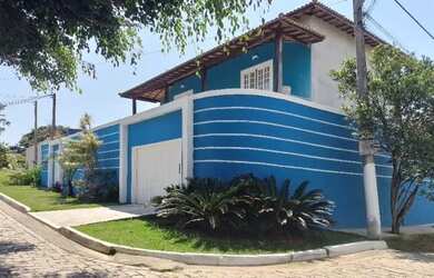 Imagem: A casa possui 4 Dormitórios, 3 Vagas na garagem e está localizado