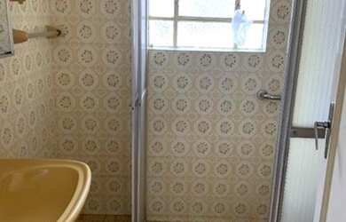 Imagem: A casa possui 3 Dormitórios, 2 Banheiros, 3 Vagas na garagem