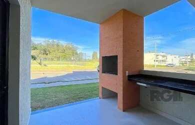 Imagem 14: Casa em Porto Alegre, no bairro Hípica, com 3 dormitório s , e 3 banheiros,...