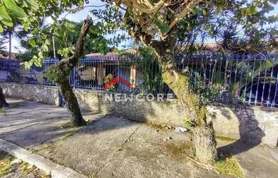 Imagem: A casa possui 4 Dormitórios, 5 Banheiros, 2 Vagas na garagem