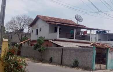 Imagem: A casa possui 2 Dormitórios, Acomodam 10 pessoas, 1 Vaga na