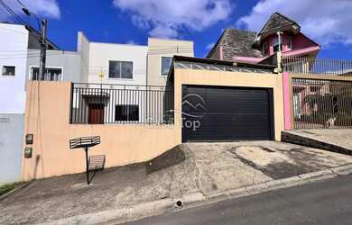 Imagem: A casa possui 2 Dormitórios, 2 Banheiros, 2 Vagas na garagem