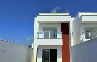 Imagem: A casa possui 3 Dormitórios, 3 Banheiros, 4 Vagas na garagem