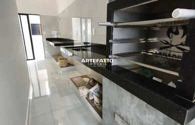 Imagem: A casa possui 3 Dormitórios, 2 Banheiros, 2 Vagas na garagem