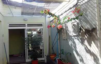 Imagem: A casa possui 2 Dormitórios, 3 Banheiros, 3 Vagas na garagem