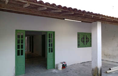 Imagem: A casa possui 2 Dormitórios, 1 Banheiro, 1 Vaga na garagem