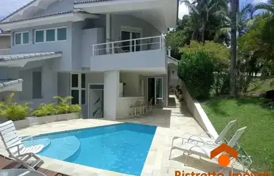 Imagem: A casa em condomínio possui 4 Dormitórios, 5 Banheiros, 4