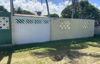 Imagem: A casa possui 3 Dormitórios, 3 Banheiros, 5 Vagas na garagem