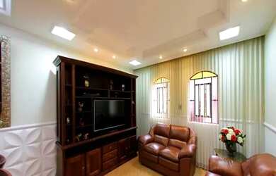 Imagem: A casa possui 4 Dormitórios, 2 Banheiros, 238m² de Área e