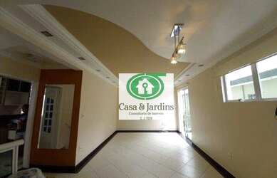 Imagem: A casa possui 3 Dormitórios, 4 Banheiros, 2 Vagas na garagem