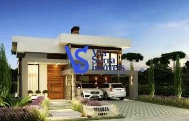 Imagem: A casa possui 3 Dormitórios, 4 Banheiros, 2 Vagas na garagem