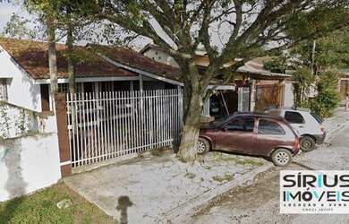 Imagem: A casa possui 3 Dormitórios, 3 Banheiros, 3 Vagas na garagem