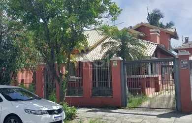 Imagem: A casa possui 2 Dormitórios, 4 Banheiros, 3 Vagas na garagem