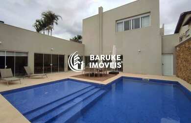 Imagem: A casa em condomínio possui 4 Dormitórios, 5 Banheiros, 5