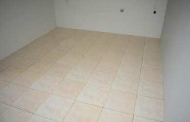 Imagem: A kitnet possui 1 Dormitório, 1 Banheiro, 1 Vaga na garagem