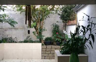 Imagem: A casa possui 3 Dormitórios, 2 Banheiros, 2 Vagas na garagem