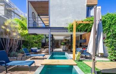 Imagem: A casa em condomínio possui 3 Dormitórios, 5 Banheiros, 4