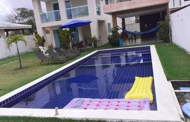 Imagem: A casa possui 5 Dormitórios, 4 Vagas na garagem e está localizado