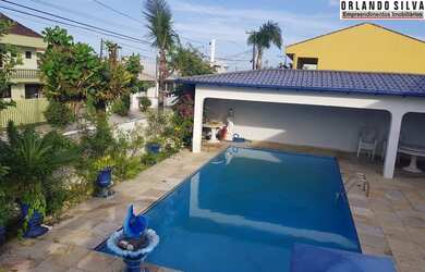 Imagem: A casa possui 5 Dormitórios, 5 Banheiros, 4 Vagas na garagem