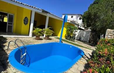 Imagem: A casa possui 3 Dormitórios, 3 Banheiros, 3 Vagas na garagem