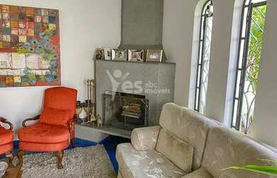 Imagem: A casa possui 3 Dormitórios, 5 Banheiros, 5 Vagas na garagem