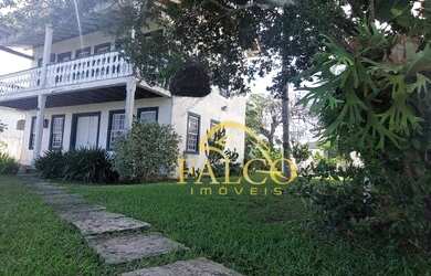 Imagem: A casa possui 5 Dormitórios, 5 Banheiros, 5 Vagas na garagem