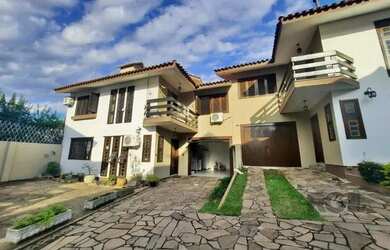 Imagem: A casa em condomínio possui 3 Dormitórios, 3 Banheiros, 2