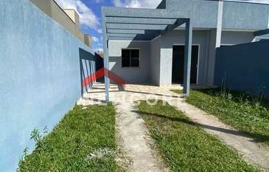 Imagem: A casa possui 3 Dormitórios, 2 Banheiros, 3 Vagas na garagem