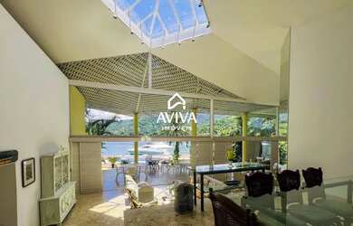 Imagem 12: Deslumbrante residência costeira no renomado Condomínio Portogalo, em...