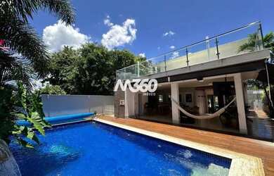 Imagem: A casa possui 4 Dormitórios, 5 Banheiros, 5 Vagas na garagem