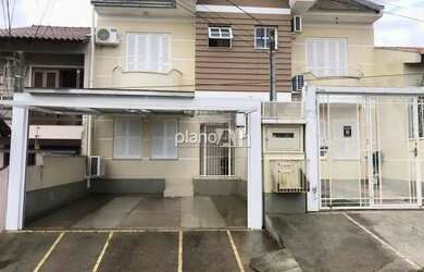 Imagem: A casa possui 3 Dormitórios, 3 Banheiros, 1 Vaga na garagem